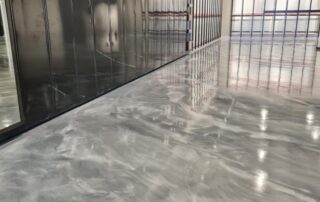 This image shows a metallic epoxy floor in an industrial plant.